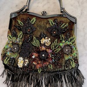 Unique beaded purse. Vibrant colors. Gorgeous detailing. Exc cond